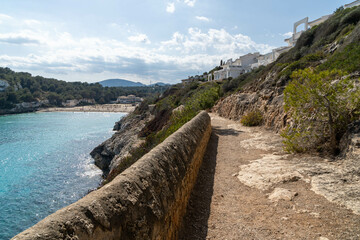 Wall Mural - path to the beach Cala Estany d'en Mas, porto christo, mallorca, spain