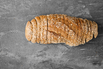 Wall Mural - Close-up image of a bread cutting on a white background isolated dark background