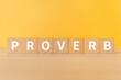 諺・格言のイメージ｜「PROVERB」と書かれた積み木