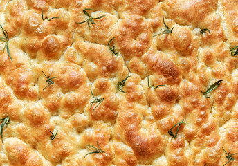 Canvas Print - Homemade rosemary focaccia bread, above view, close up.