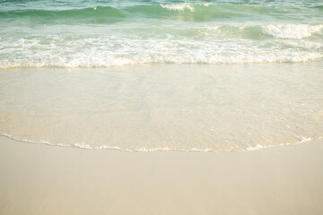 Wave on Sand beach with blue sea at coast. beautiful blue ocean shore outdoor nature landscape water  background. tourist summer travel holidays tropical season.