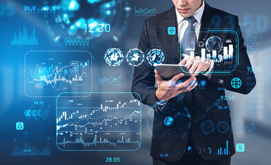 Poster - Businessman using tablet in hands, forex diagrams and graphs