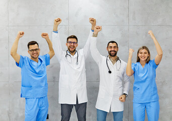 Wall Mural - doctor hospital team medical nurse health medicine teamwork professional healthcare clinic group uniform happy smiling celebrating success victory partnership