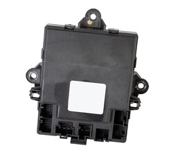 Poster - Plastic car engine control unit with plastic elements on a white isolated background is connecting center of various subsystems, units and assemblies. Monitoring the state of the moment. Spare part