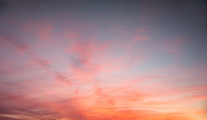 Wall Mural - beautiful sunset sky scenery with gradient colors from orange and pink to slate blue