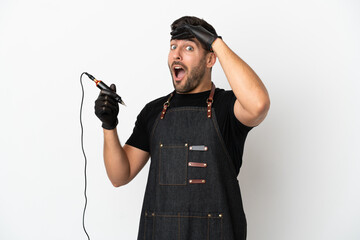 Canvas Print - Tattoo artist man isolated on white background doing surprise gesture while looking to the side