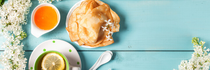 Wall Mural - Breakfast - muesli, croissant, tea, jam, pancakes