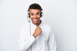 © luismolinero - Telemarketer Brazilian man working with a headset isolated on white background celebrating a victory