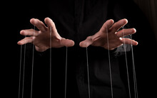 Man Hands With Strings On Fingers. Manipulation, Negative Influence Or Addiction Concept. Becoming Dependent On Alcohol, Drugs, Gambling. High Quality Photo