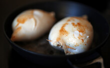 Stuffed Squid Carcasses In A Frying Pan.