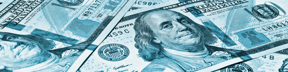 Wall Mural - american paper money. 100 dollar and other us notes. blue tinted banner or header. savings economy a