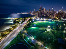 Aerial View Of City Skyline, Park And DuSable Lake Shore Drive At Night, Chicago, Illinois, USA