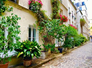 Wall Mural - Window with flowers on the beautiful green street of rue de Termopyles in Paris' 14 arrondissement