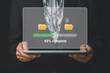 © Mongta Studio - Transfer files data system relocation concept, Person hand using digital tablet waiting for transfer file process with loading bar icon on virtual screen..