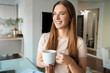 © Stock 4 You - Close up of woman look in distance enjoy weekend at home drinking warm tea