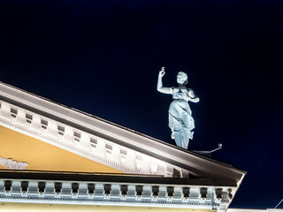 Wall Mural - illuminated figures on the pediment of the Opera House