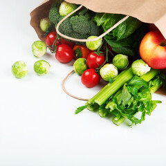 Wall Mural - Raw vegetables on light background.