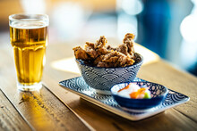 Beer Served With Fried Chicken At Restaurant