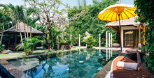 Indonesia, Bali, Panoramic View Of Poolside Of Luxurious Villa In Summer