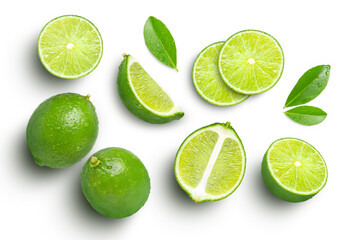 lime fruits with green leaf and cut in half slice isolated on white background. top view. flat lay.