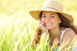 © Antonioguillem - Happy woman with white smile in a field looking at camera