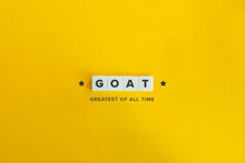 GOAT (Greatest Of All Time) Slang Word. Letter Tiles On Yellow Background. Minimal Aesthetics.