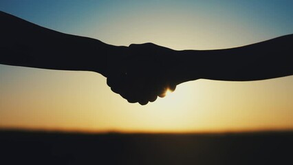 Poster - handshake farmers silhouette. agriculture business concept. close-up farmers hands silhouette shaking hands silhouette making a contract agreement. farmers negotiations in agriculture sun business