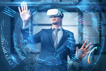 businessman with vr glasses and creative round digital business chart interface on blurry office interior background. Stock, finance, trade and technology concept. 