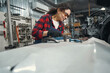 © Viacheslav Yakobchuk - Woman auto mechanic working in automobile garage