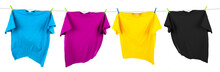 Colorful CMYK Colored T-shirts On Clothes Line Isolated White Background. Cyan Magenta Yellow Key Symbol And Printing Indursty Concept.