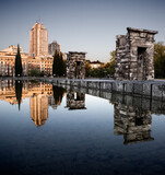 Fototapeta Kuchnia - panoramic of the Debod temple reflected in a pond of water with blue sky in the background the plaza de España in the city of Madid Spain