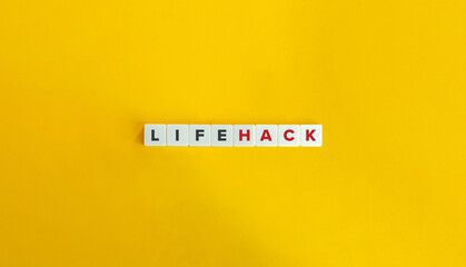 Wall Mural - Life Hack Phrase and Banner. Letter Tiles on Yellow Background. Minimal Aesthetics.