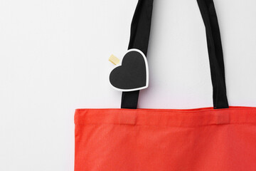 Wall Mural - Cotton tote shopper bag with heart tag on white background