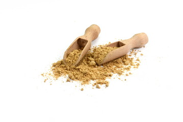 Wall Mural - Dry ginger powder isolated on white background. Pile of dry ginger powder in a scoop.