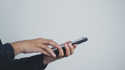 Wall Mural - technology concept social media man using smart phon access online media Through the Internet, there is marketing to answer customer chats. by working at home