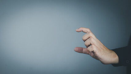 Wall Mural - man's hand concept The man is spreading his hands at the level of his chest. Suitable for making products, products or symbols to put together with pictures.