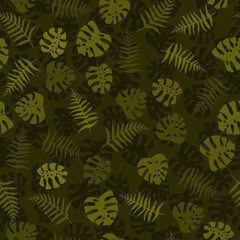 Seamless camouflage tropical pattern with tropical plants. Print with monstera leaves.