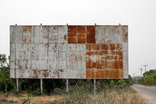 The Old Billboard Is Damaged.
Old Billboards. An Antique Sign On The Roadside. View Board
