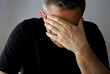 © aykutkarahan - a depressed man with a headache