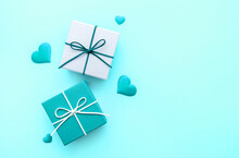 Gift Boxes With Hearts Of Light Turquoise Blue. Gifts For The Christmas Holiday Or The Birthday. Love Background. Copy Space For Text. Color Banner