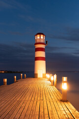 Wall Mural - Lighthouse at Lake Neusiedl, Podersdorf am See, Austria. Lighthouse after sunset