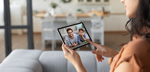 Poster - Brunette woman using tablet, calling her family