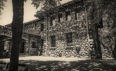 Wall Mural - Stone house in the forest in black and white