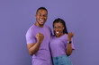 © Prostock-studio - Portrait of excited young black couple hearing great news