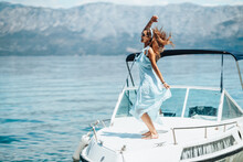 Woman Having Fun While Spending Day On Private Yacht
