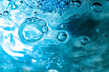 Wall Mural - Water bubbles abstract bokeh light in the pool