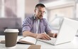 © BillionPhotos.com - Young smiling man in glasses using laptop sitting at home desk, watching webinar studying online,