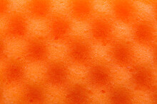 Orange Cleaning Sponge As Background, Top View