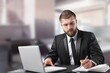 © BillionPhotos.com - Young Businessman Using Laptop Computer Sitting During Break