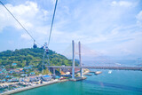 Fototapeta Natura - Yeosu Maritime Cable Car is the first of its kind in Korea, connecting Dolsan Island and the mainland over the ocean.